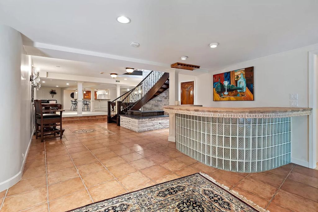 The Residence in Oak Brook is a luxurious home restructured and remodeled the exterior and interior, now available for sale. This home located at 1611 Midwest Club Pkwy, Oak Brook, Illinois