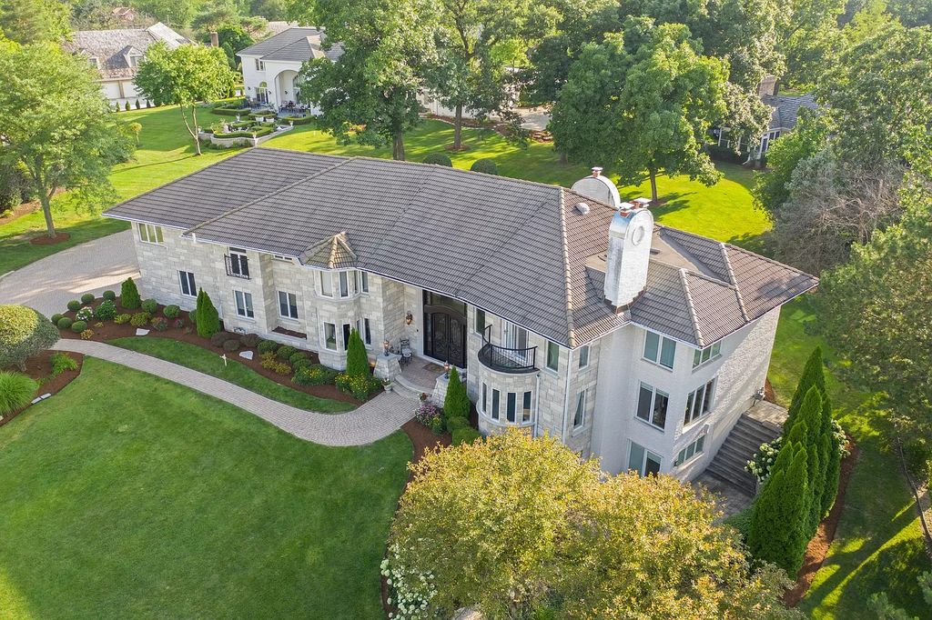 The Residence in Oak Brook is a luxurious home restructured and remodeled the exterior and interior, now available for sale. This home located at 1611 Midwest Club Pkwy, Oak Brook, Illinois