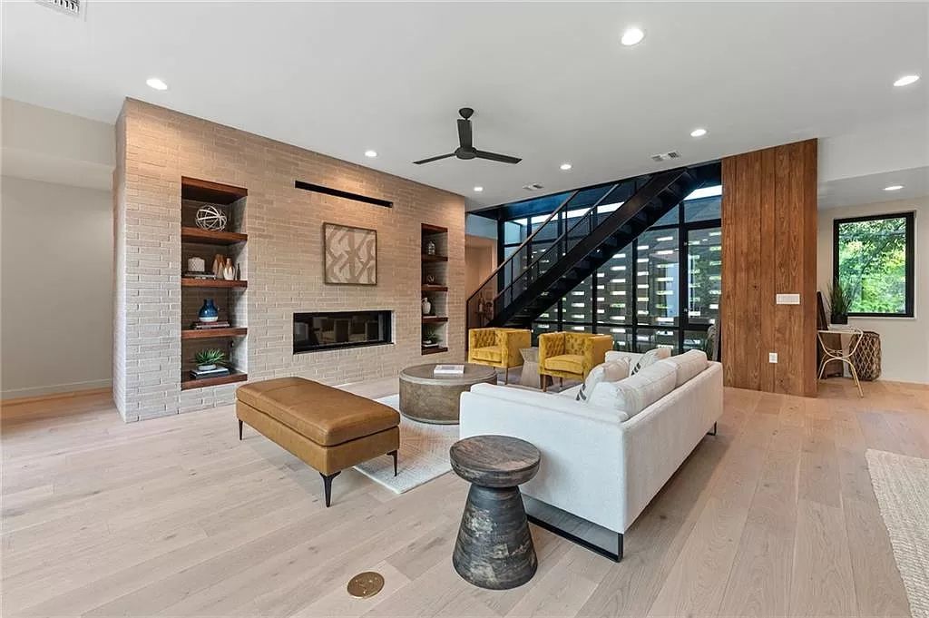 The Home in Austin, a new construction designed by Davey McEathron offers a wide open floor plan and floor-to-ceiling windows allowing for abundant natural light is now available for sale. This home located at 2104 Ann Arbor Ave, Austin, Texas