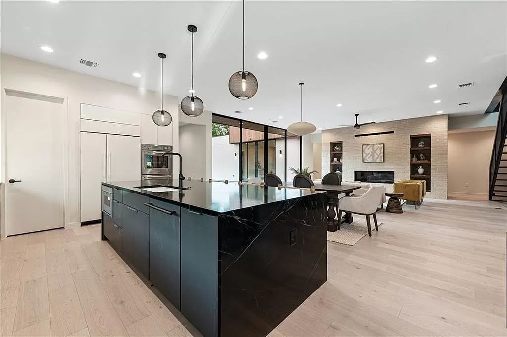 The Home in Austin, a new construction designed by Davey McEathron offers a wide open floor plan and floor-to-ceiling windows allowing for abundant natural light is now available for sale. This home located at 2104 Ann Arbor Ave, Austin, Texas