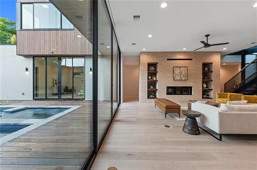 The Home in Austin, a new construction designed by Davey McEathron offers a wide open floor plan and floor-to-ceiling windows allowing for abundant natural light is now available for sale. This home located at 2104 Ann Arbor Ave, Austin, Texas