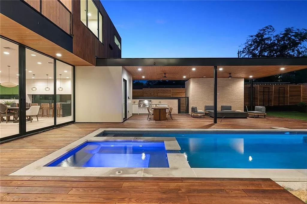 The Home in Austin, a new construction designed by Davey McEathron offers a wide open floor plan and floor-to-ceiling windows allowing for abundant natural light is now available for sale. This home located at 2104 Ann Arbor Ave, Austin, Texas