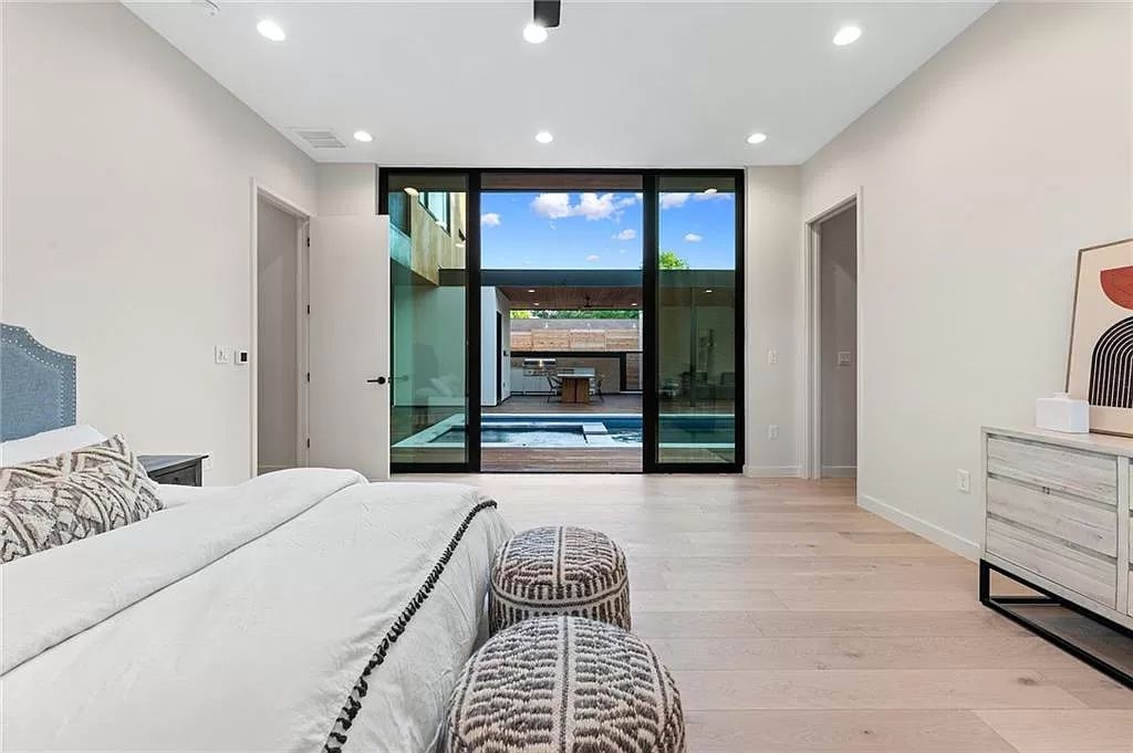 The Home in Austin, a new construction designed by Davey McEathron offers a wide open floor plan and floor-to-ceiling windows allowing for abundant natural light is now available for sale. This home located at 2104 Ann Arbor Ave, Austin, Texas