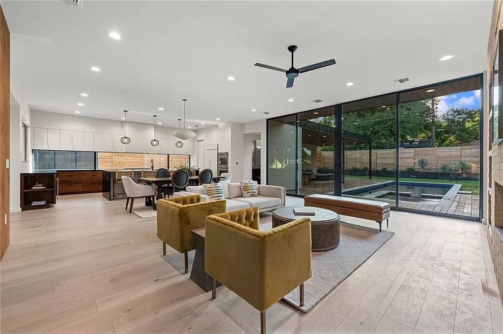 The Home in Austin, a new construction designed by Davey McEathron offers a wide open floor plan and floor-to-ceiling windows allowing for abundant natural light is now available for sale. This home located at 2104 Ann Arbor Ave, Austin, Texas