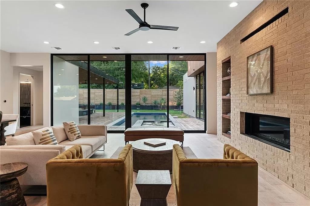 The Home in Austin, a new construction designed by Davey McEathron offers a wide open floor plan and floor-to-ceiling windows allowing for abundant natural light is now available for sale. This home located at 2104 Ann Arbor Ave, Austin, Texas