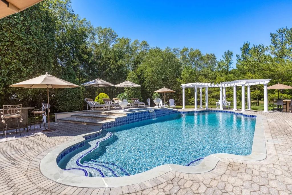 The Home in Colts Neck is a luxurious home with master craftsmanship and outstanding upgrades throughout, now available for sale. This home located at 14 Shadowbrook Drive, Colts Neck, New Jersey