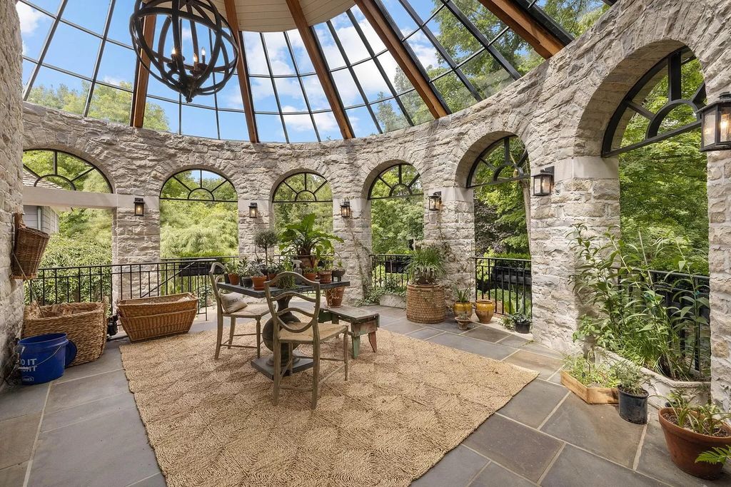 The Home in Dublin offers expansive living room with panoramic unreplicatable views, now available for sale. This home located at 5000 Deer Run Dr, Dublin, Ohio