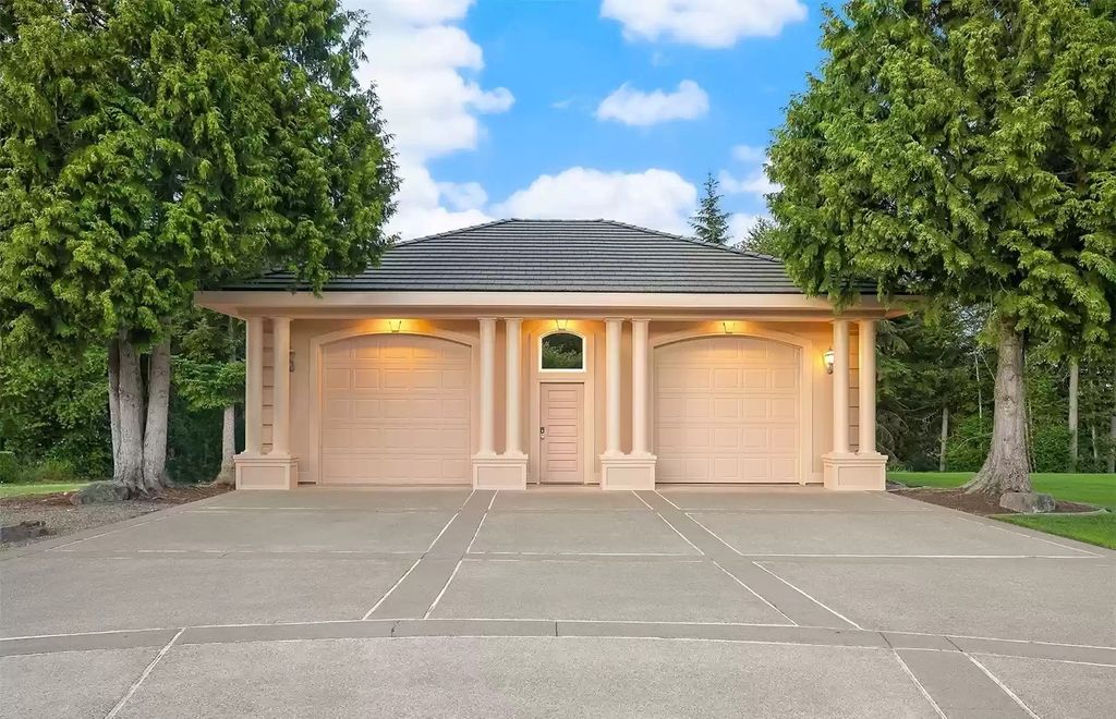 The Estate in Auburn is a luxurious home located on a tranquil setting with nature surrounding now available for sale. This home located at 20927 SE 322nd Street, Auburn, Washington; offering 04 bedrooms and 05 bathrooms with 4,610 square feet of living spaces.