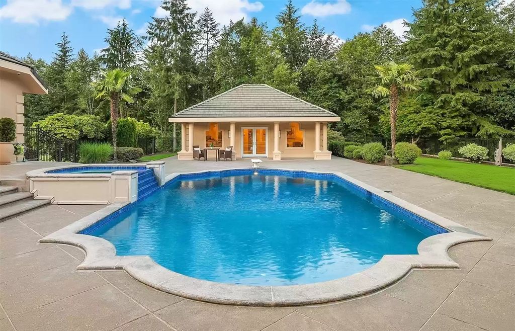 The Estate in Auburn is a luxurious home located on a tranquil setting with nature surrounding now available for sale. This home located at 20927 SE 322nd Street, Auburn, Washington; offering 04 bedrooms and 05 bathrooms with 4,610 square feet of living spaces.