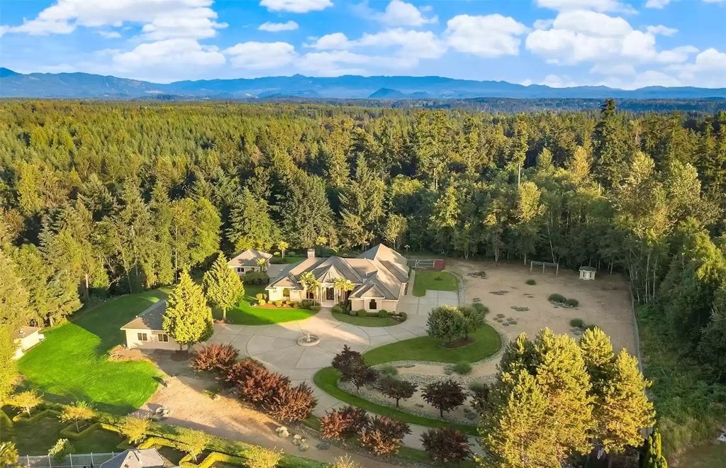 The Estate in Auburn is a luxurious home located on a tranquil setting with nature surrounding now available for sale. This home located at 20927 SE 322nd Street, Auburn, Washington; offering 04 bedrooms and 05 bathrooms with 4,610 square feet of living spaces.