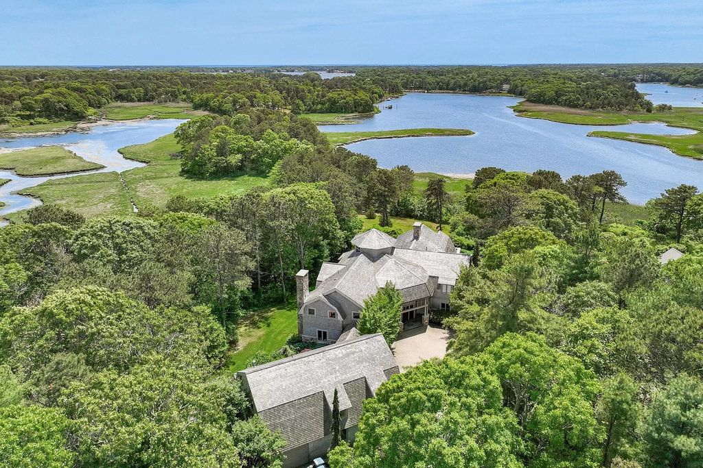 The Estate in Osterville includes a spacious main house and guest quarters comprised of the finest finishes to complement the beautiful modern architecture, now available for sale. This home located at 1825 South County Road, Osterville, Massachusetts