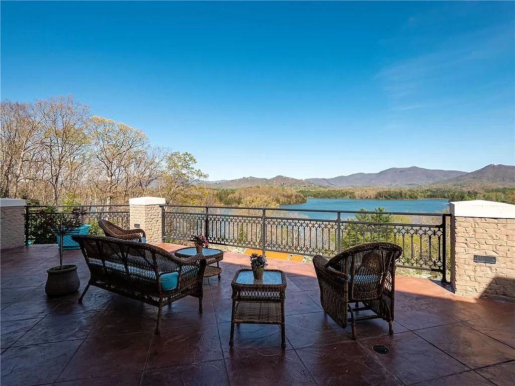 The Estate in Hiawassee is a one-of-a-kind legacy property with timeless architecture now available for sale. This home located at 1970 Hilltop Dr, Hiawassee, Georgia