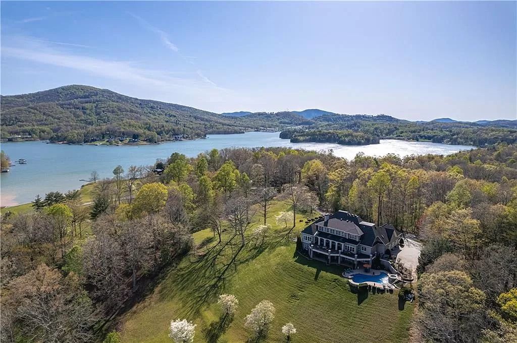 The Estate in Hiawassee is a one-of-a-kind legacy property with timeless architecture now available for sale. This home located at 1970 Hilltop Dr, Hiawassee, Georgia