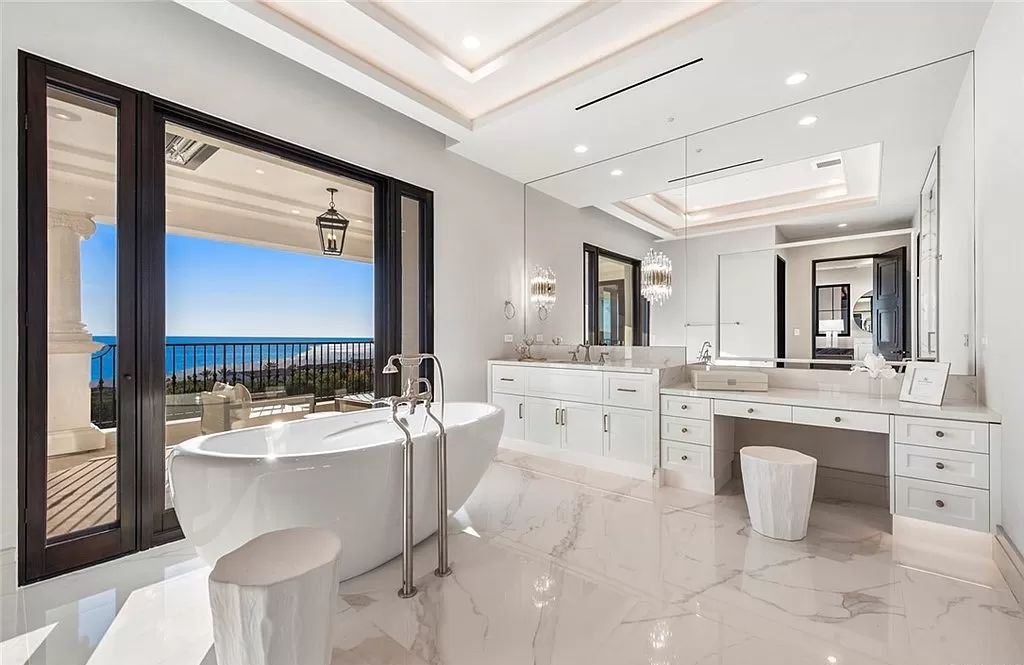 The Villa in Newport Coast, a Crystal Cove’s newest estate with southwest facing views in the exclusive enclave offering a lifestyle of unparalleled luxury is now available for sale. This home located at 22 Midsummer, Newport Coast, California 