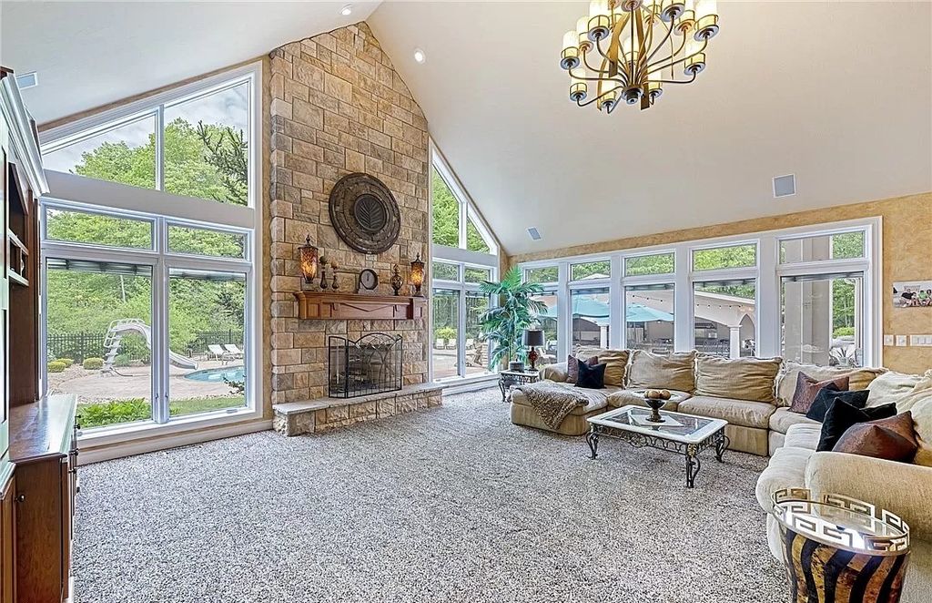 The Home in Solon offers elegant architectural details, exceptional craftsmanship, and resort-style entertaining areas, now available for sale. This home located at 36895 Halton Ct, Solon, Ohio