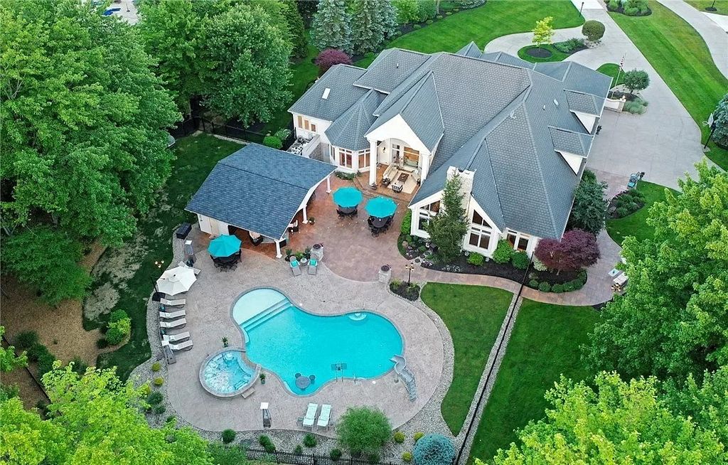 The Home in Solon offers elegant architectural details, exceptional craftsmanship, and resort-style entertaining areas, now available for sale. This home located at 36895 Halton Ct, Solon, Ohio