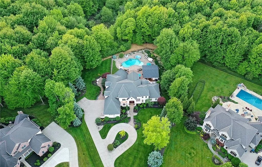 The Home in Solon offers elegant architectural details, exceptional craftsmanship, and resort-style entertaining areas, now available for sale. This home located at 36895 Halton Ct, Solon, Ohio