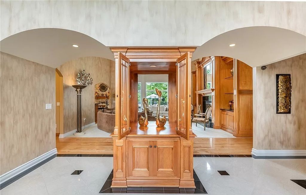 The Home in Solon offers elegant architectural details, exceptional craftsmanship, and resort-style entertaining areas, now available for sale. This home located at 36895 Halton Ct, Solon, Ohio