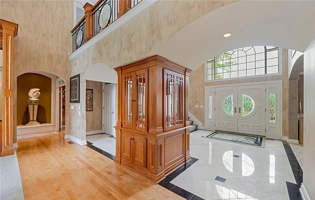 The Home in Solon offers elegant architectural details, exceptional craftsmanship, and resort-style entertaining areas, now available for sale. This home located at 36895 Halton Ct, Solon, Ohio