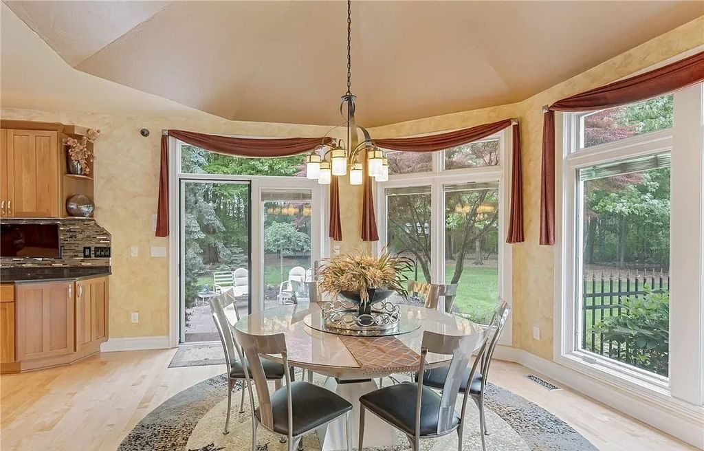The Home in Solon offers elegant architectural details, exceptional craftsmanship, and resort-style entertaining areas, now available for sale. This home located at 36895 Halton Ct, Solon, Ohio