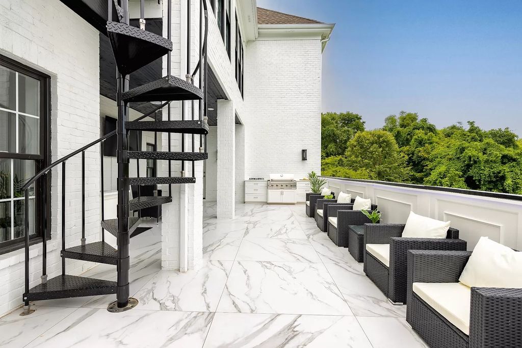 The Estate in Brentwood is a luxurious home with timeless elegant design and modern finishes, now available for sale. This home located at 9572 Hampton Reserve Dr, Brentwood, Tennessee