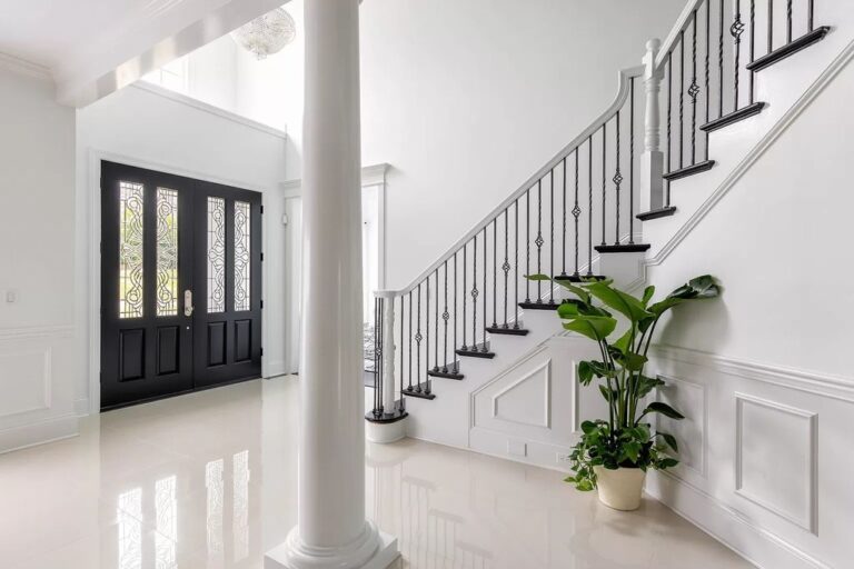 Located in one of The Most Desirable Gated Communities in Brentwood, This Elegant Estate Asks