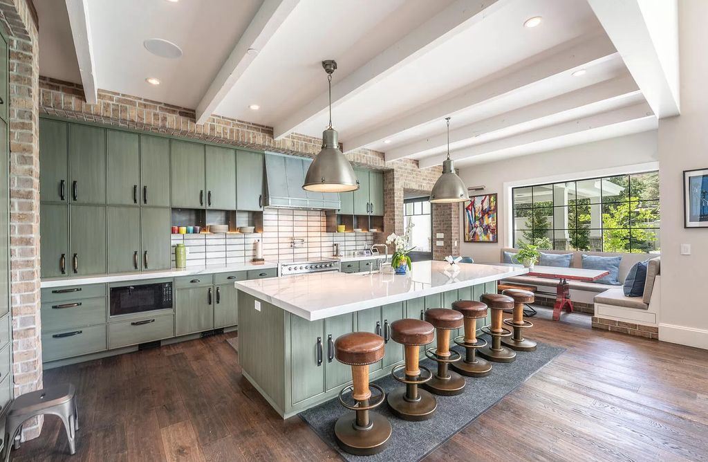 If you have a kitchen island, consider painting it green or using green-toned materials for its construction. A green kitchen island can become the centerpiece of your kitchen, adding a vibrant and eye-catching element to the space.