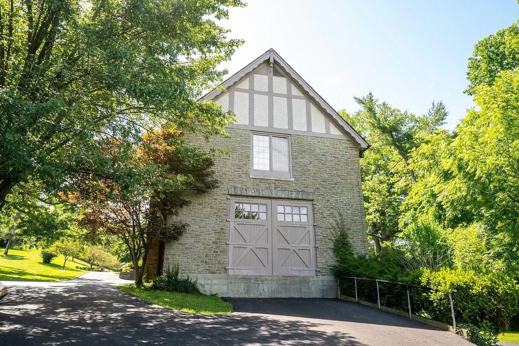 The Estate in New Richmond offers stunning great room with wood paneled ceiling walks out to patio and pool, now available for sale. This home located at 1104 Us Route 52, New Richmond, Ohio