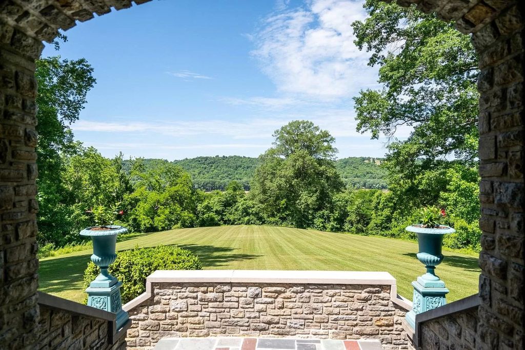 The Estate in New Richmond offers stunning great room with wood paneled ceiling walks out to patio and pool, now available for sale. This home located at 1104 Us Route 52, New Richmond, Ohio