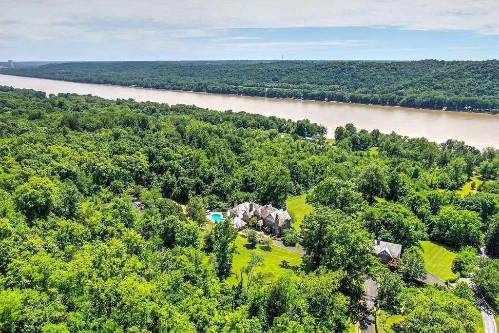 The Estate in New Richmond offers stunning great room with wood paneled ceiling walks out to patio and pool, now available for sale. This home located at 1104 Us Route 52, New Richmond, Ohio