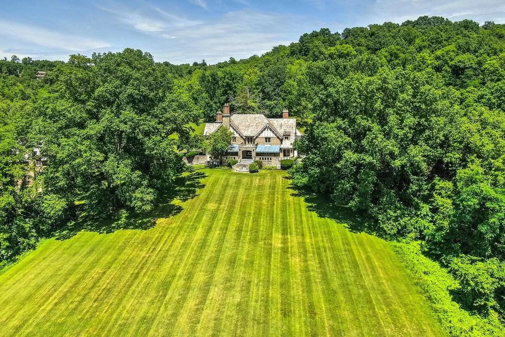 The Estate in New Richmond offers stunning great room with wood paneled ceiling walks out to patio and pool, now available for sale. This home located at 1104 Us Route 52, New Richmond, Ohio