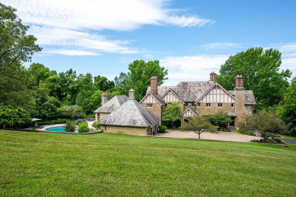 The Estate in New Richmond offers stunning great room with wood paneled ceiling walks out to patio and pool, now available for sale. This home located at 1104 Us Route 52, New Richmond, Ohio