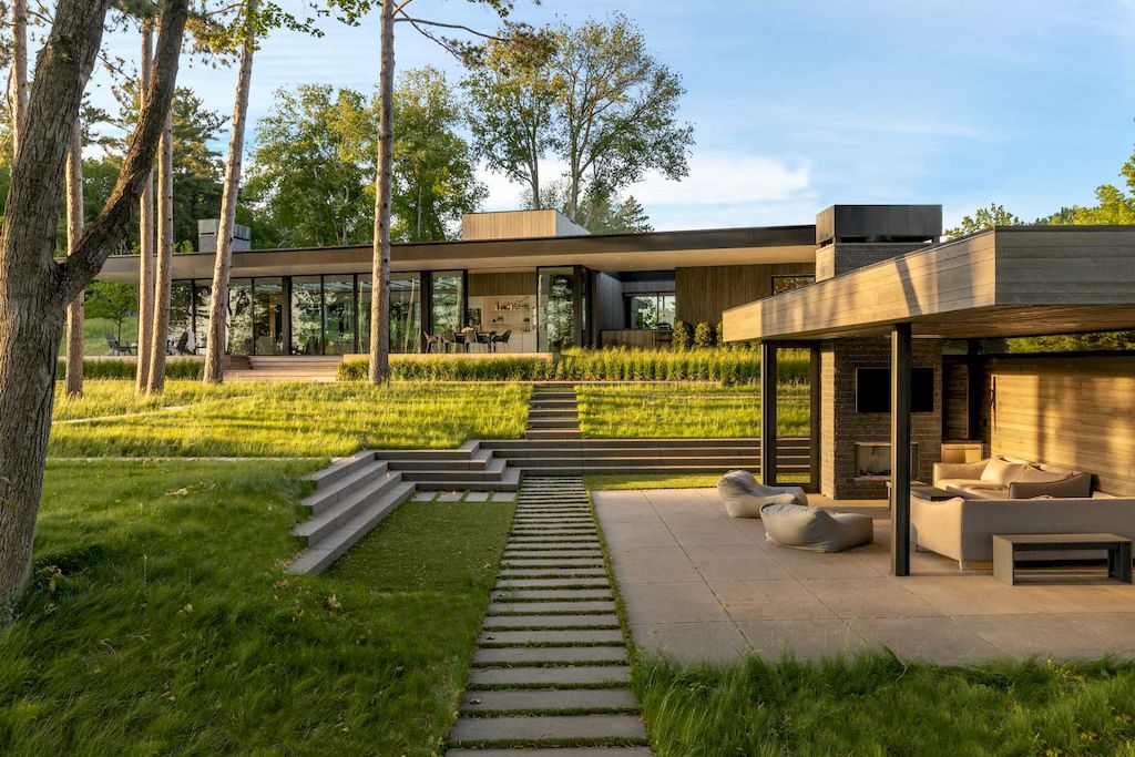 Minnetonka Minimalism house with the glass walls by Charlie & Co. Design