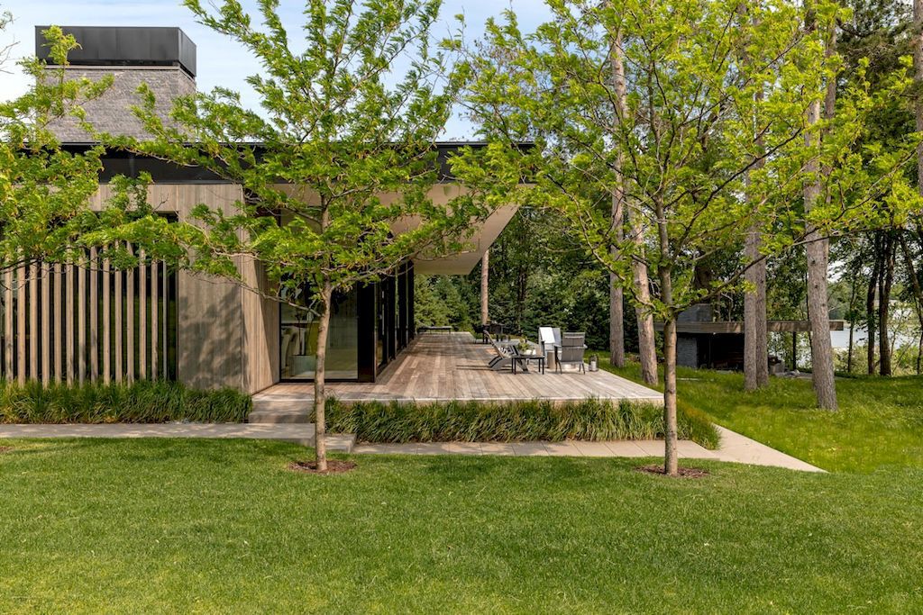 Minnetonka Minimalism house with the glass walls by Charlie & Co. Design