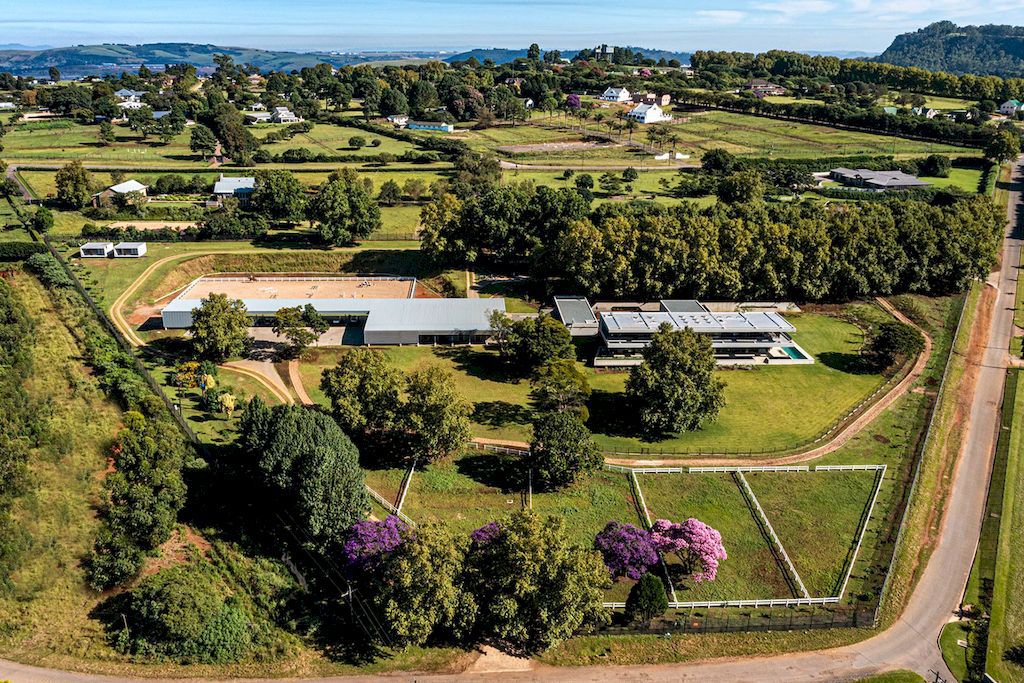 Oban State House in Fusion with Nature by Metropole Architects