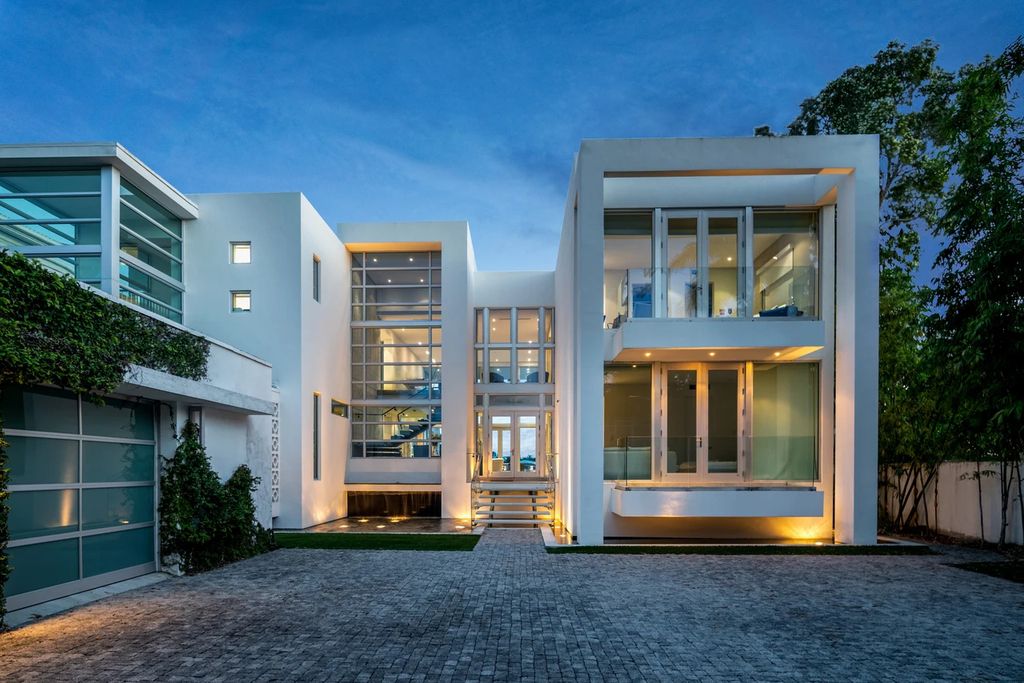 The Masterpiece in Surfside, a fabulous estate just minutes from the beach and renowned Bal Habour Shops was built to highest standard and luxurious finishes is now available for sale. This home located at 1236 Biscaya Dr, Surfside, Florida
