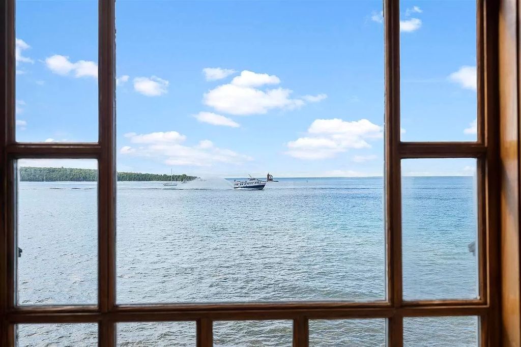 The Homes on Mackinac Island is a luxurious home with astonishing views take your breath away, now available for sale. This home located at 7575 Main St, Mackinac Island, Michigan