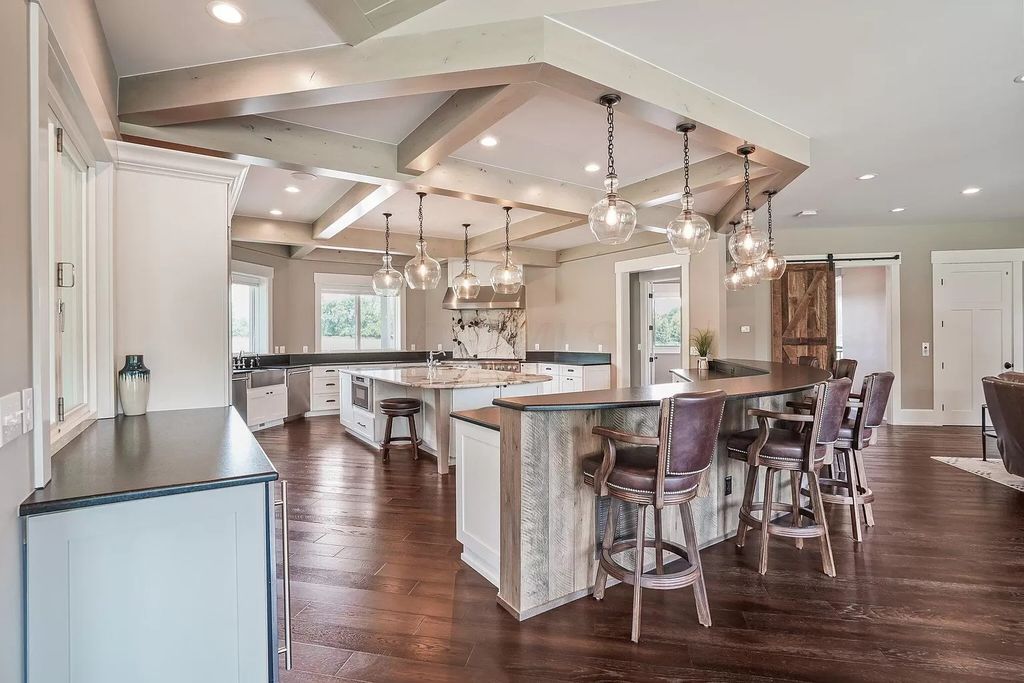 The Estate in Powell is a luxurious home featuring a grand chef's kitchen with top of the line appliances and plenty of space to entertain now available for sale. 