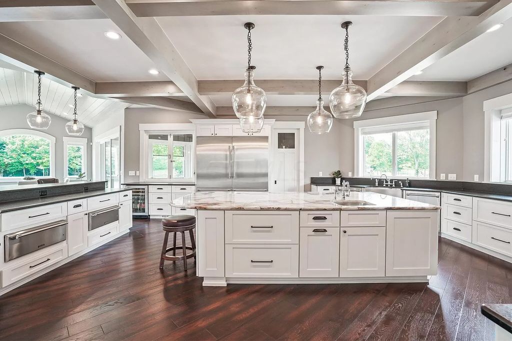 The Estate in Powell is a luxurious home featuring a grand chef's kitchen with top of the line appliances and plenty of space to entertain now available for sale. 