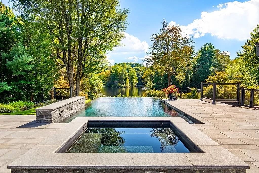 The Estate in Westwood is a luxurious home perfectly set at the end of a secluded acres now available for sale. This home located at 300 Summer St, Westwood, Massachusetts; offering 06 bedrooms and 09 bathrooms with 10,309 square feet of living spaces. 