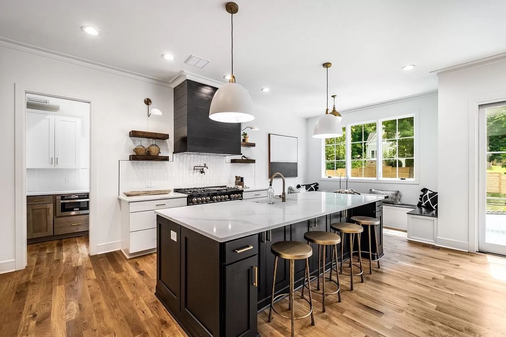 The House in Nashville boasts three levels of living with a Savaria elevator for all floors, now available for sale. This home located at 4024 General Bate Dr, Nashville, Tennessee