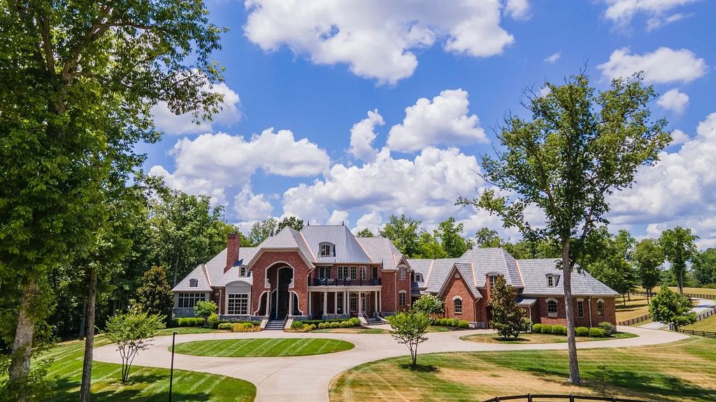 The Estate in Ashland City is a luxurious home with marble tiled floors and walls in each bath, hardwoods throughout, now available for sale. This home located at 2925 Old Clarksville Pike, Ashland City, Tennessee