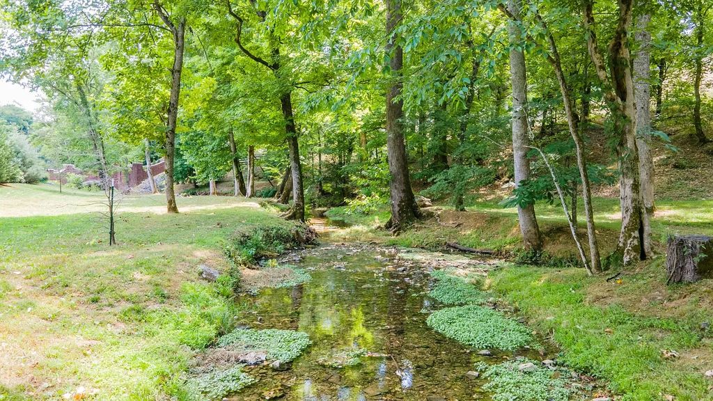 The Estate in Ashland City is a luxurious home with marble tiled floors and walls in each bath, hardwoods throughout, now available for sale. This home located at 2925 Old Clarksville Pike, Ashland City, Tennessee