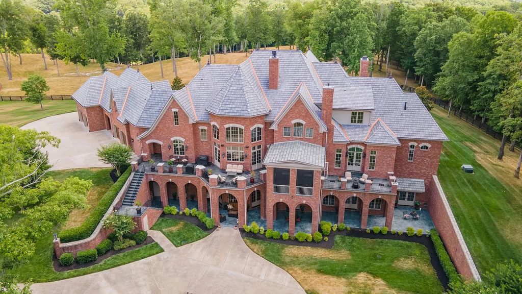 The Estate in Ashland City is a luxurious home with marble tiled floors and walls in each bath, hardwoods throughout, now available for sale. This home located at 2925 Old Clarksville Pike, Ashland City, Tennessee