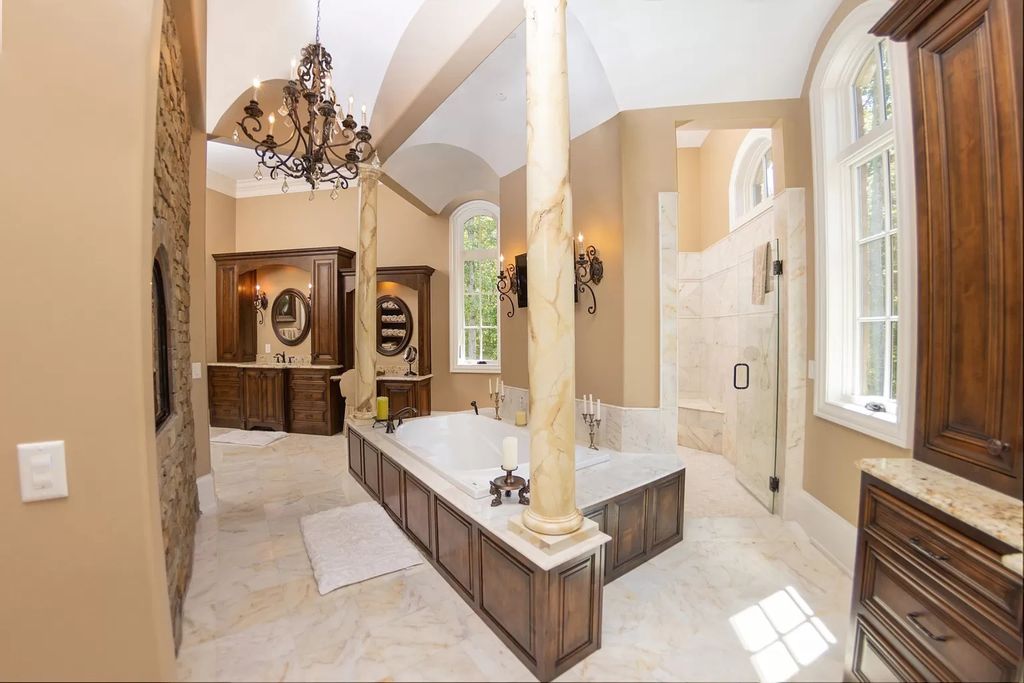 The Estate in Ashland City is a luxurious home with marble tiled floors and walls in each bath, hardwoods throughout, now available for sale. This home located at 2925 Old Clarksville Pike, Ashland City, Tennessee