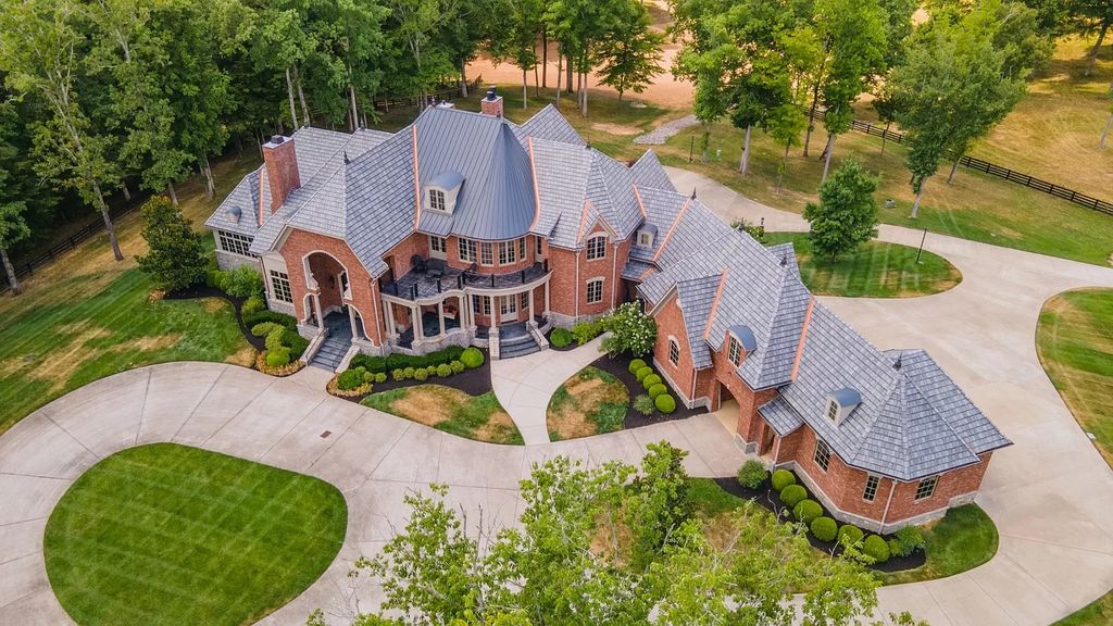 The Estate in Ashland City is a luxurious home with marble tiled floors and walls in each bath, hardwoods throughout, now available for sale. This home located at 2925 Old Clarksville Pike, Ashland City, Tennessee