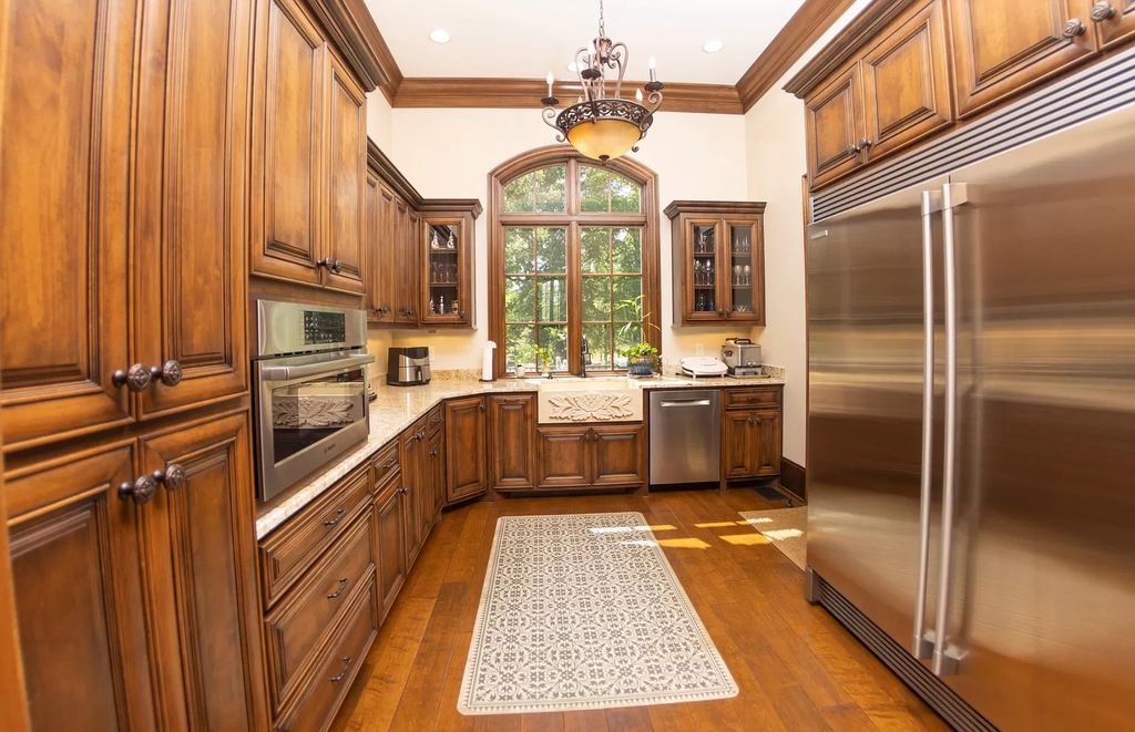 The Estate in Ashland City is a luxurious home with marble tiled floors and walls in each bath, hardwoods throughout, now available for sale. This home located at 2925 Old Clarksville Pike, Ashland City, Tennessee