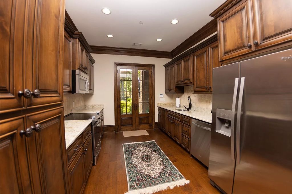 The Estate in Ashland City is a luxurious home with marble tiled floors and walls in each bath, hardwoods throughout, now available for sale. This home located at 2925 Old Clarksville Pike, Ashland City, Tennessee