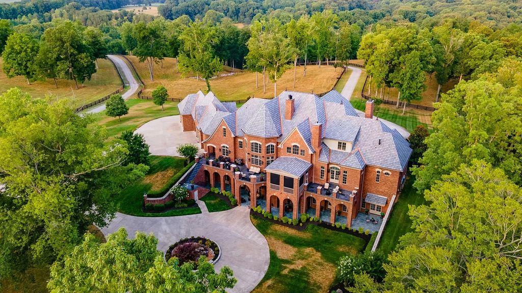 The Estate in Ashland City is a luxurious home with marble tiled floors and walls in each bath, hardwoods throughout, now available for sale. This home located at 2925 Old Clarksville Pike, Ashland City, Tennessee