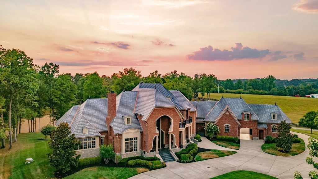 The Estate in Ashland City is a luxurious home with marble tiled floors and walls in each bath, hardwoods throughout, now available for sale. This home located at 2925 Old Clarksville Pike, Ashland City, Tennessee